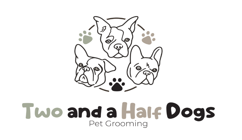 Two and a Half Dogs Pet Grooming logo